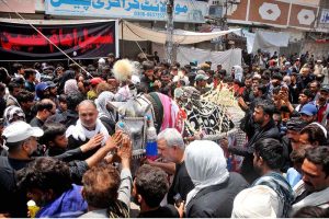 A large number of mourners attending the procession on 9th of the Holy Month of Muharramul Haram passing through Mumtazabad. Muharramul Haram is known as the first month of the Islamic calendar and the mourning month in remembrance of the martyrdom (Shahadat) of Hazrat Imam Hussain (RA), the grandson of the Holy Prophet Mohammad (PBUH)