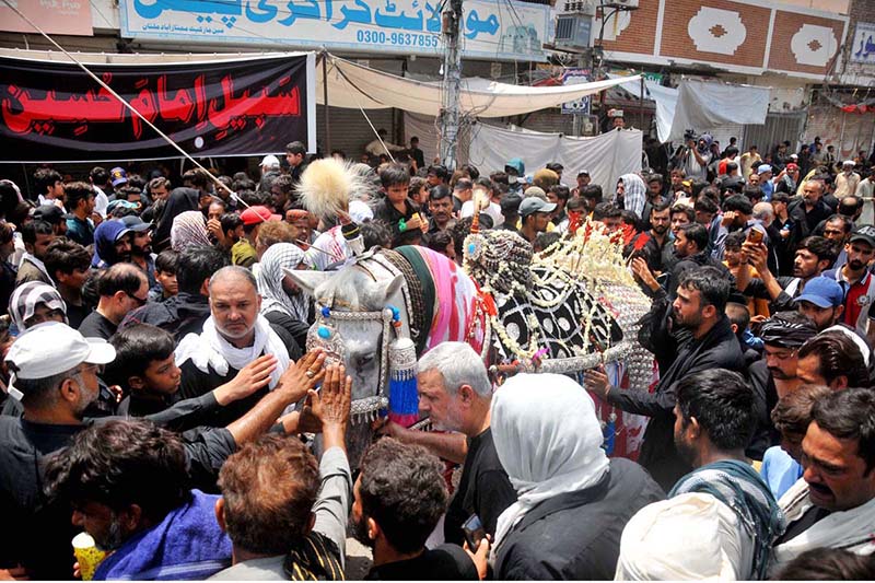 A large number of mourners attending the procession on 9th of the Holy Month of Muharramul Haram passing through Mumtazabad. Muharramul Haram is known as the first month of the Islamic calendar and the mourning month in remembrance of the martyrdom (Shahadat) of Hazrat Imam Hussain (RA), the grandson of the Holy Prophet Mohammad (PBUH)