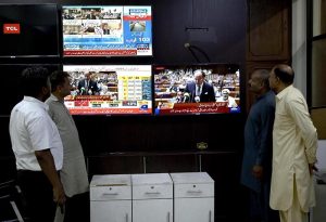 A citizen's eyes are fixed on the screen on the budget speech of Finance Minister Muhammad Aurangzeb as he presents the Federal Budget 2026-27 in the National Assembly at Parliament House, reflecting the widespread public interest in the country's economic direction and fiscal policies