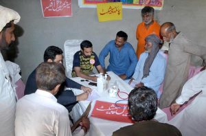Residents receive free medical checkups and medicines at a camp organised under the auspices of Anjuman Islamia Hospital Chiniot at Chak No. 131 Loony Wala, on the directives of Federal Minister for Board of Investment Qaiser Ahmad Sheikh.