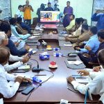 Members of the Hyderabad Chamber of Small Traders and Small Industry watch the live Federal Budget 2026–27 session on television screen at the chamber’s office