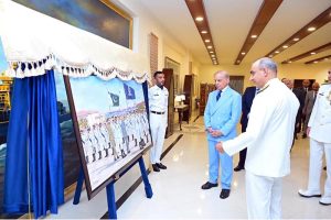 Commandant Pakistan Naval Academy, PNS Rahbar presenting a painting to the Prime Minister Muhammad Shehbaz Sharif