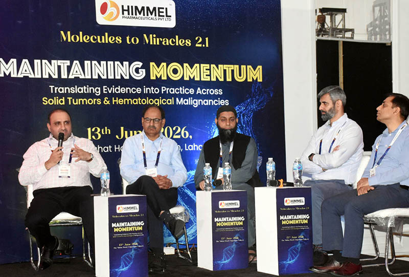Panelists Dr. Tahir Bashir, Prof. Dr. Muhammad Khalid, Dr. Ahmed Farooq, Salman Arif, and Dr. Sameed Hussain answer questions during a session on recent advances in cancer research and treatment technologies at an event hosted by Hamal Pharmaceuticals