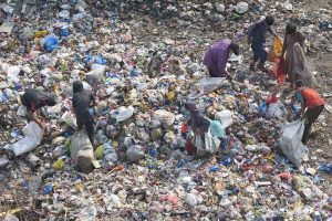 Gypsy children search for reusable or recyclable materials from a garbage dumping in the Provincial Capital
