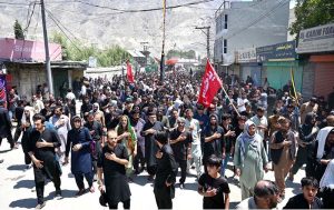 A large number of mourners attending central Ashura procession on 10th of Holy Month of Muharram-ul-Harram. Muharram is the mourning month in remembrance of the Shahadat of Hazrat Imam Hussain (RA), the Grandson of the Holy Prophet Mohammad (PBUH)