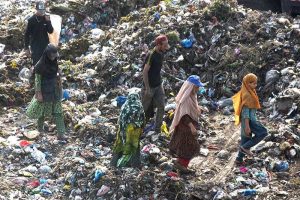 Gypsy children search for reusable or recyclable materials from a garbage dumping in the Provincial Capital