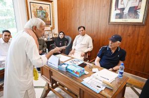 Defense Minister Khawaja Asif is listening to the public's problems at his office in Cantt.