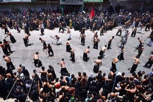 Mourners oozing themselves with knives and chains during Ashura procession at Station Road on 10th of Holy Month of Muharramul Harram. Muharram is the mourning month in remembrance of the Shahadat of Imam Hussain (RA) the grandson of the Holy Prophet Mohammad (PBUH)