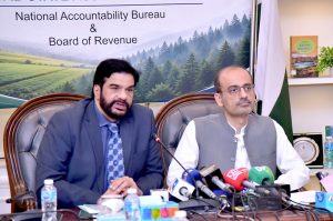 Director General , NAB Lahore, Mirza Faran Baig and Senior Member Board of Revenue Punjab Nabeel Javed address a press conference.