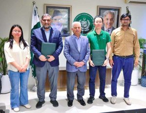 Federal Minister for National Food Security & Research, Rana Tanveer Hussain, and Animal Husbandry Commissioner Dr. Syed Murtaza Hassan Andrabi signing the Material Transfer Agreement on buffalo genetic resources with the Royal Group of China.