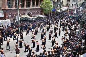 Mourners oozing themselves with knives and chains during Ashura procession at Station Road on 10th of Holy Month of Muharramul Harram. Muharram is the mourning month in remembrance of the Shahadat of Imam Hussain (RA) the grandson of the Holy Prophet Mohammad (PBUH)