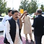 A parliamentarian arrives at Parliament House ahead of the National Assembly session for the presentation of the Federal Budget FY2026–27 in the federal capital
