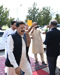 A parliamentarian arrives at Parliament House ahead of the National Assembly session for the presentation of the Federal Budget FY2026–27 in the federal capital
