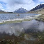 A mesmerizing view of Shandur Lake, a stunning alpine glacial lake at 3,700 meters on the Shandur Plateau, lying at the border of Chitral and Ghizer near the iconic Shandur Polo Ground