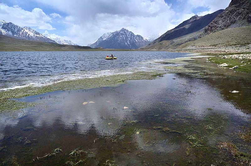 A mesmerizing view of Shandur Lake, a stunning alpine glacial lake at 3,700 meters on the Shandur Plateau, lying at the border of Chitral and Ghizer near the iconic Shandur Polo Ground