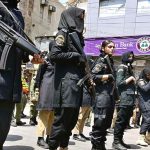 Women commandos stands high alert during the Ashura procession at Station Road on the 10th of Holy Month of Muharramul Harram. Muharram is the mourning month in remembrance of the Shahadat of Imam Hussain (RA) the grandson of the Holy Prophet Mohammad (PBUH)