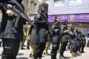 Women commandos stands high alert during the Ashura procession at Station Road on the 10th of Holy Month of Muharramul Harram. Muharram is the mourning month in remembrance of the Shahadat of Imam Hussain (RA) the grandson of the Holy Prophet Mohammad (PBUH)