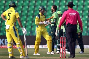 Australian batsman Alex Carey walks back to the pavilion after being bowled by Shaheen Shah Afridi during the second One Day International (ODI) between Pakistan and Australia at Gaddafi Stadium.