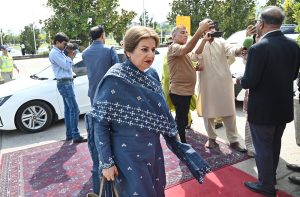 A parliamentarian arrives at Parliament House ahead of the National Assembly session for the presentation of the Federal Budget FY2026–27 in the federal capital