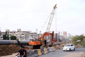 A view of the development work of RedLine BRT is underway with the help of heavy machinery near Expo center in the Provincial Capital
