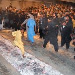 Mourners walking on burning coals during a procession on 9th of Murramul Harram at Tando Jahania. Muharramul Haram is known as the first month of the Islamic calendar and the mourning month in remembrance of the martyrdom (Shahadat) of Hazrat Imam Hussain (RA), the grandson of the Holy Prophet Mohammad (PBUH)