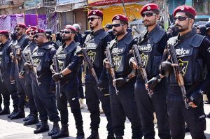 Women commandos stands high alert during the Ashura procession at Station Road on the 10th of Holy Month of Muharramul Harram. Muharram is the mourning month in remembrance of the Shahadat of Imam Hussain (RA) the grandson of the Holy Prophet Mohammad (PBUH)