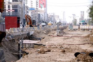 A view of the development work of RedLine BRT is underway with the help of heavy machinery near Expo center in the Provincial Capital