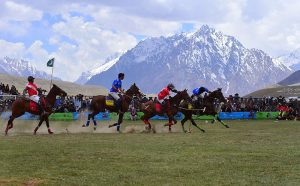 Players from Gilgit-Baltistan and Chitral battle fiercely during the final of the Shandur Polo Festival 2026, as thousands of spectators packed on the surrounding hillsides watch the thrilling contest that Gilgit-Baltistan won 6-5 to end a 12-year wait for victory over their traditional rivals at the world’s highest historic Shandur polo Ground