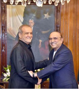President Asif Ali Zardari shaking hands with President of the Islamic Republic of Iran, Dr. Masoud Pezeshkian, at Aiwan-e-Sadr.