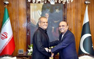 President Asif Ali Zardari shaking hands with President of the Islamic Republic of Iran, Dr. Masoud Pezeshkian, at Aiwan-e-Sadr.