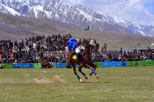 Players from Gilgit-Baltistan and Chitral battle fiercely during the final of the Shandur Polo Festival 2026, as thousands of spectators packed on the surrounding hillsides watch the thrilling contest that Gilgit-Baltistan won 6-5 to end a 12-year wait for victory over their traditional rivals at the world’s highest historic Shandur polo Ground