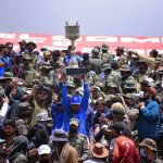 A Gilgit-Baltistan player lifts the Shandur Polo Festival 2026 trophy aloft amid jubilant celebrations after defeating Chitral 6-5 in a thrilling final at the historic Shandur Polo Ground, ending a 12-year wait for victory over their traditional rivals at the world's highest polo ground