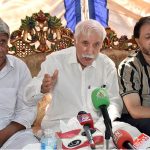 Federal Minister for Investment Board Qaiser Ahmed Sheikh talks to media during a free medical camp organized under the supervision of Islamia Hospital at Chak no 134 Loony Wala