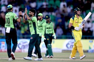 Australian batter Adam Zampa is being bowled by Shadab Khan during the third One-day International (ODI) cricket match between Pakistan and Australia at Gaddafi Stadium.