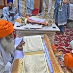 Sikh pilgrims perform rituals during a ceremony marking the Martyrdom Day of Guru Arjan Dev Ji at Gurdwara Dera Sahib. Hundreds of pilgrims are attending the 420th anniversary of the fifth Sikh Guru’s martyrdom