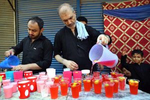 ICRC volunteers preparing summer drink to serve the mourners attending the procession on 10th of the Muharram-ul-Harram at Kuchi Bazaar. Muharram-ul-Harram is known as the first month of the Islamic calendar and the mourning month in remembrance of the martyrdom (Shahadat) of Hazrat Imam Hussain (RA), the grandson of the Holy Prophet Mohammad (PBUH)