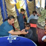 A physician examines a young child during a free medical camp organised for underprivileged citizens during a free medical camp organized under the supervision of Islamia Hospital at Chak no 134 Loony Wala