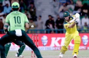Australian batter Adam Zampa is being bowled by Shadab Khan during the third One-day International (ODI) cricket match between Pakistan and Australia at Gaddafi Stadium.