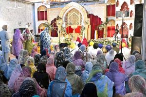 Sikh pilgrims perform rituals during a ceremony marking the Martyrdom Day of Guru Arjan Dev Ji at Gurdwara Dera Sahib. Hundreds of pilgrims are attending the 420th anniversary of the fifth Sikh Guru’s martyrdom