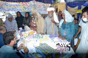 A physician examines a young child during a free medical camp organised for underprivileged citizens during a free medical camp organized under the supervision of Islamia Hospital at Chak no 134 Loony Wala