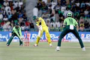 Australian batter Adam Zampa is being bowled by Shadab Khan during the third One-day International (ODI) cricket match between Pakistan and Australia at Gaddafi Stadium.