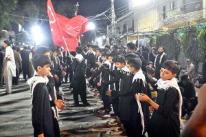 Mourners oozing themselves with knives and chains during the procession on 9th of the Holy Month of Muharramul Haram passing through Rahmatpur Road. Muharramul Haram is known as the first month of the Islamic calendar and the mourning month in remembrance of the martyrdom (Shahadat) of Hazrat Imam Hussain (RA), the grandson of the Holy Prophet Mohammad (PBUH)