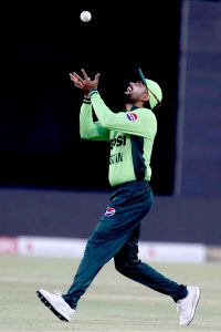 Australian batter Adam Zampa is being bowled by Shadab Khan during the third One-day International (ODI) cricket match between Pakistan and Australia at Gaddafi Stadium.