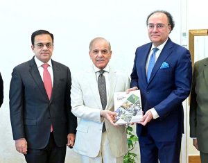 Federal Minister for Finance Muhammad Aurangzeb presents the copy of Pakistan Economic Survey-2025-26 to the Prime Minister Muhammad Shehbaz Sharif