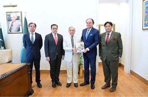Federal Minister for Finance Muhammad Aurangzeb presents the copy of Pakistan Economic Survey-2025-26 to the Prime Minister Muhammad Shehbaz Sharif