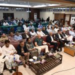Chairman BMG Zubair Motiwala, along with Acting President KCCI Mohammad Raza and members of the business community, listen to the Federal Budget 2026–27 speech by Finance Minister Muhammad Aurangzeb during a live broadcast at the Karachi Chamber of Commerce & Industry (KCCI) Auditorium