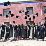 Newly graduated doctors throw their caps in the air in a traditional celebration during the second convocation of Sargodha Medical College