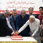 Consul General of the People's Republic of China in Lahore Sun Yan, along with renowned journalist Suhail Warraich, Yasin Khan and Khalid Abbas Dar, cuts a cake at the Children's Library during a ceremony organised by the Sundas Foundation to mark World Blood Donor Day