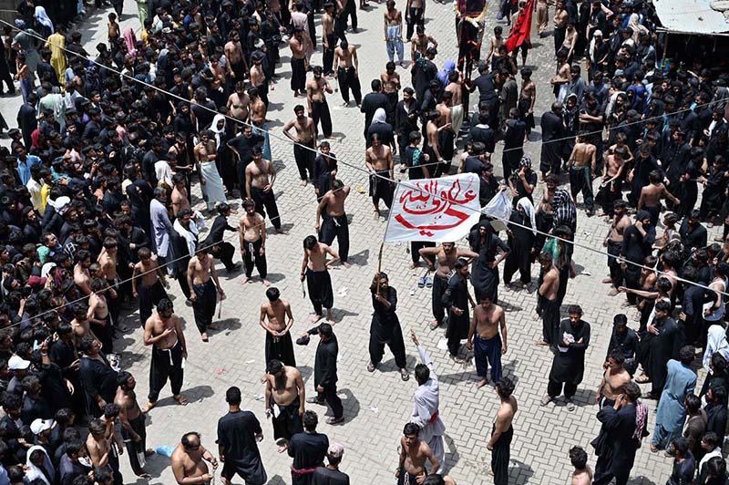 A large number of mourners attending a procession on 10th of the Holy Month of Muharram-ul-Harram. Muharram-ul-Harram is the first month of the Islamic calendar known as the mourning month in remembrance of the martyrdom (Shahadat) of Hazrat Imam Hussain (RA), the grandson of the Holy Prophet Muhammad (PBUH)