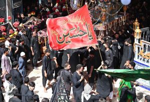 A large number of mourners attending a procession on 10th of the Holy Month of Muharram-ul-Harram. Muharram-ul-Harram is the first month of the Islamic calendar known as the mourning month in remembrance of the martyrdom (Shahadat) of Hazrat Imam Hussain (RA), the grandson of the Holy Prophet Muhammad (PBUH)